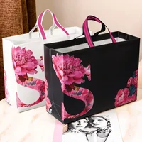 10PCS Rose Printing Packaging Shopping Bag Handle Waterproof Non Woven Fabric Gift Bags Black Clothing Store HandBag 1