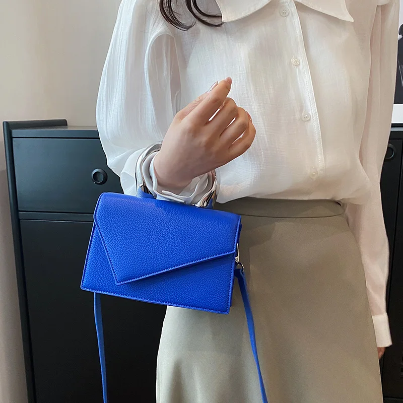 Blue in Handbags for Women