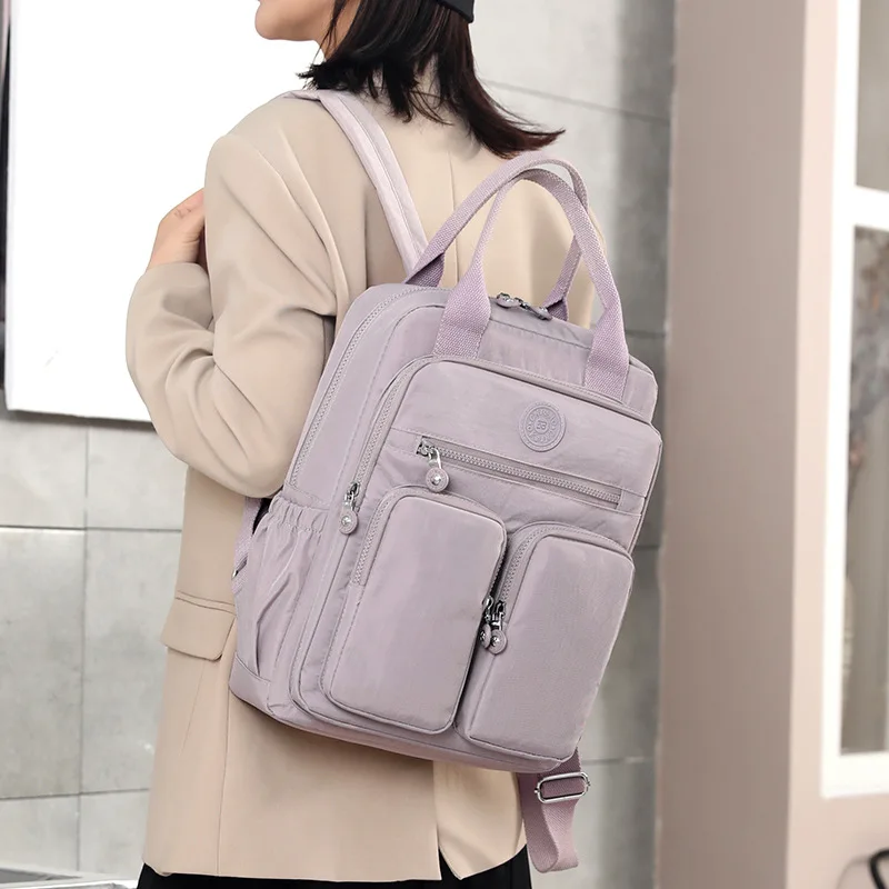 

2023 Fashion Casual Backpack Nylon Waterproof mommy Multi-functional Large capacity Solid color High quality Simple School Bags