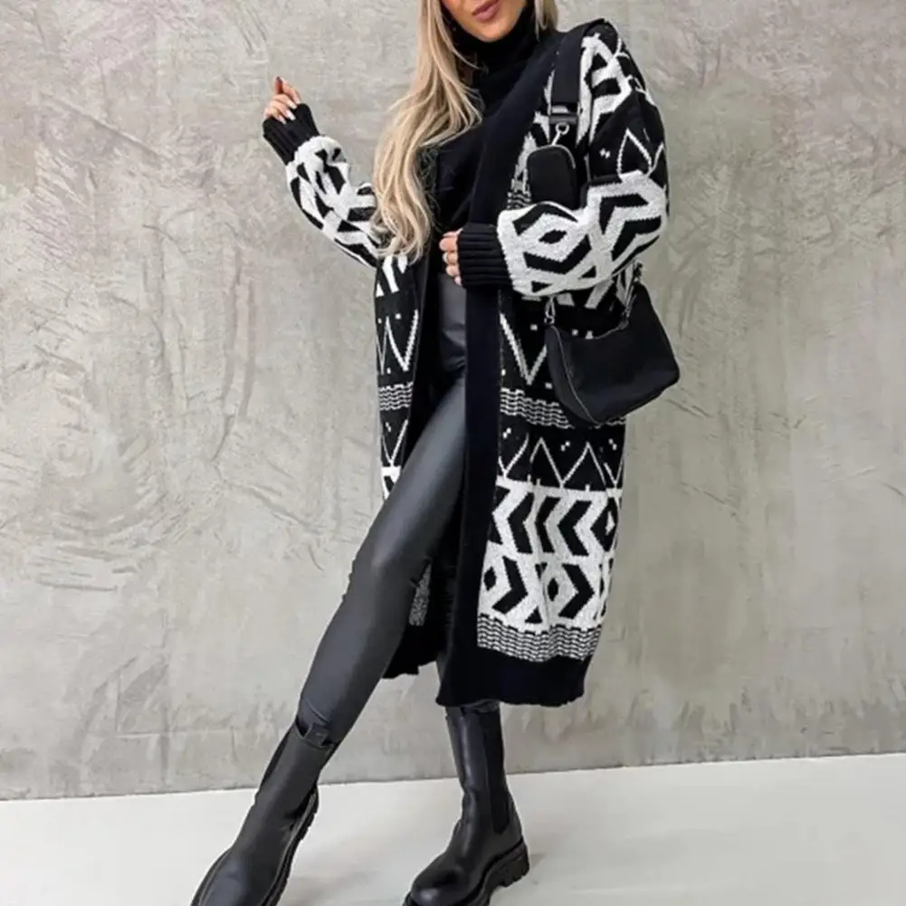 

Материал: Изготовлен из мягкой акриловой и полиэфирной ткани, этот длинный вязаный кардиган очень теплый и удобный для холодных дней.