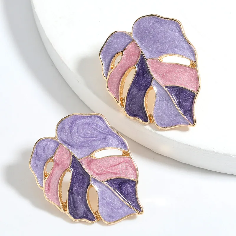 Boho Monstera Earrings up close in purple