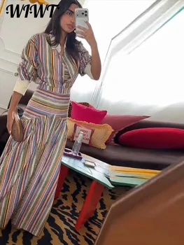 طقم نسائي بلوزة مقلّمة وتنورة طويلة بكسرات — صورة 7