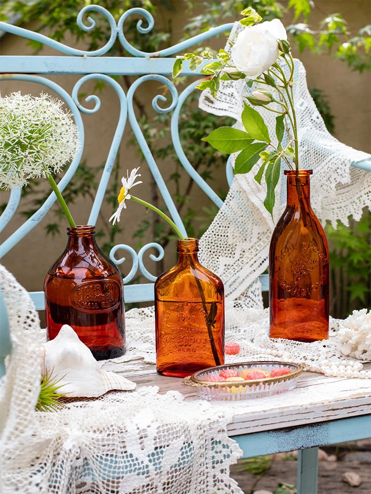 retro daisy flower amber glass pill bottle