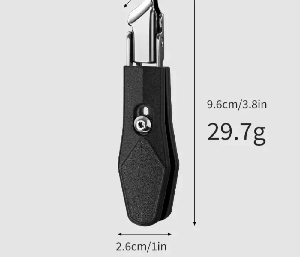 Obcinacz do paznokci ze stali nierdzewnej pokazany otwarty na płaskiej powierzchni