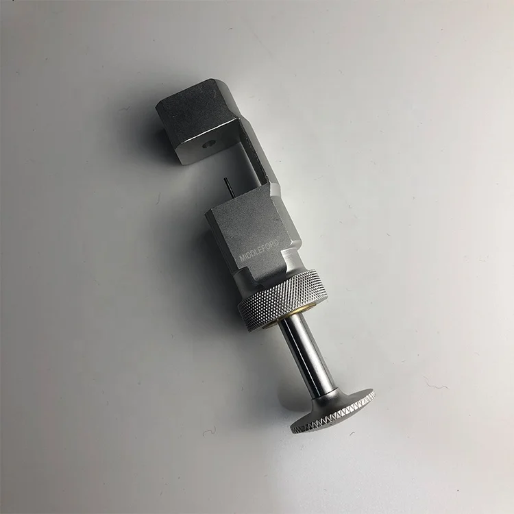 

Piano Center Pin Handler