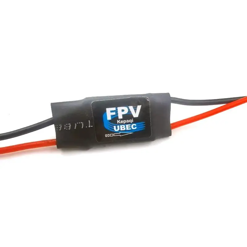Module régulateur abaisseur DC-DC UBEC 12V3A 5V3A comparé à une pièce de monnaie pour illustrer sa petite taille