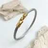 Creative wire rope and hook-shaped stainless steel 18K women's bracelet, light luxury and versatile wear 1