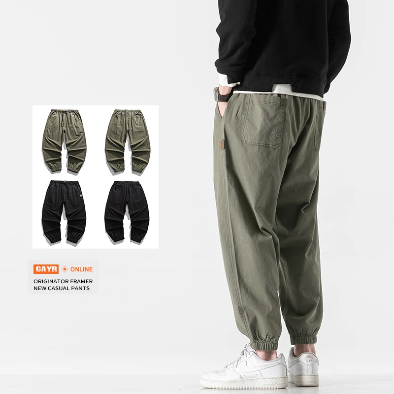 

2022 men's spring and summer new two-color leather label decoration wide version casual jogging trousers