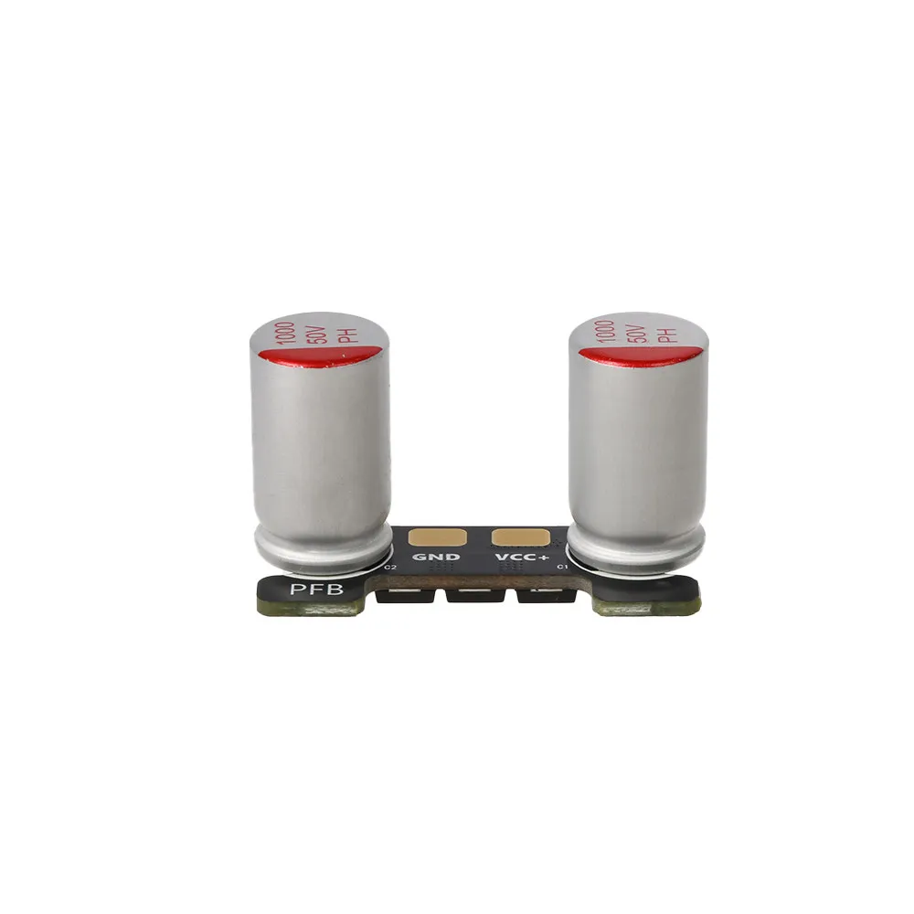 Condensateurs RUSHFPV PFB PRO Dual 50V 100µF installés sur une carte de drone FPV, suppresseur de surtension.