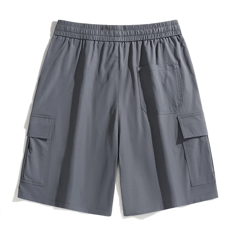Fashion Elastic Spliced Pockets Straight Casual Shorts Men's Clothing 2024 Summer New Loose Solid Color High Waist Knee Shorts