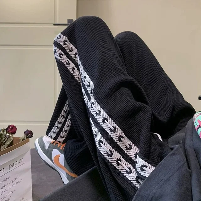 Pantalones informales con estampado de retales para hombre, pantalón holgado de pierna ancha, liso, con bolsillos, estilo americano, a la moda, para otoño