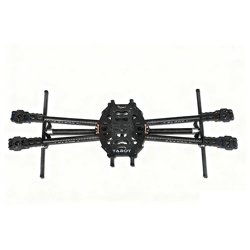 Kit cadre drone FPV en fibre de carbone Toray 3K ultra-léger 476g pliable, plié pour le transport, avec les charnières et le mécanisme de pliage en détail.