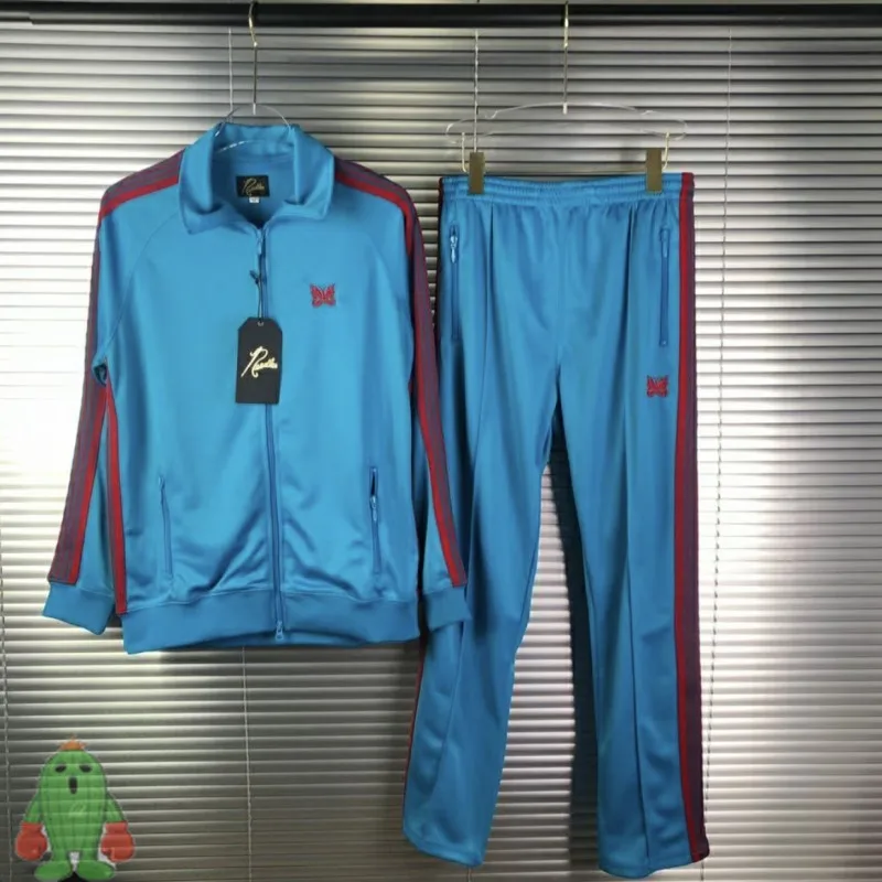 

Men Women Blue Tracksuit AWGE Needles Jacket Red Embroidered Butterfly Ribbon Sweatpants High Street Needles Jogging Trousers