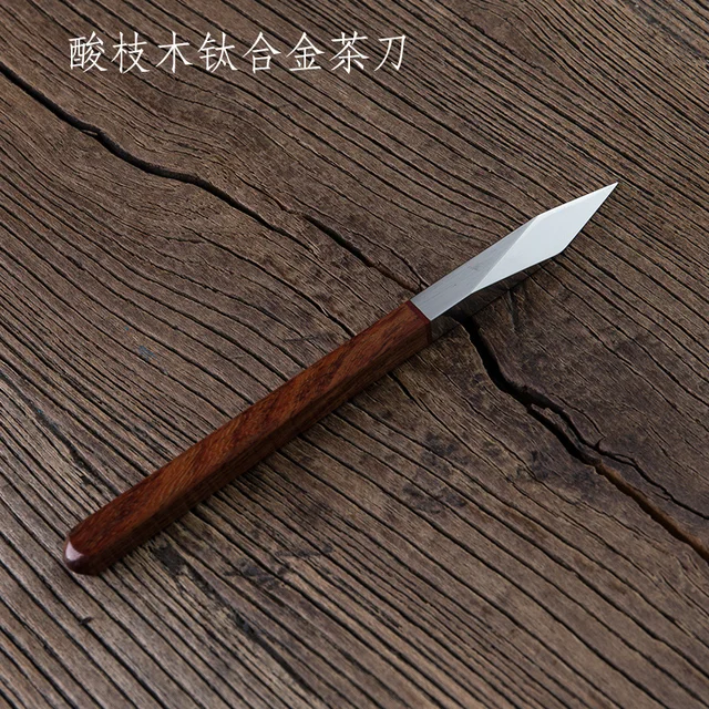 Gold tea knife