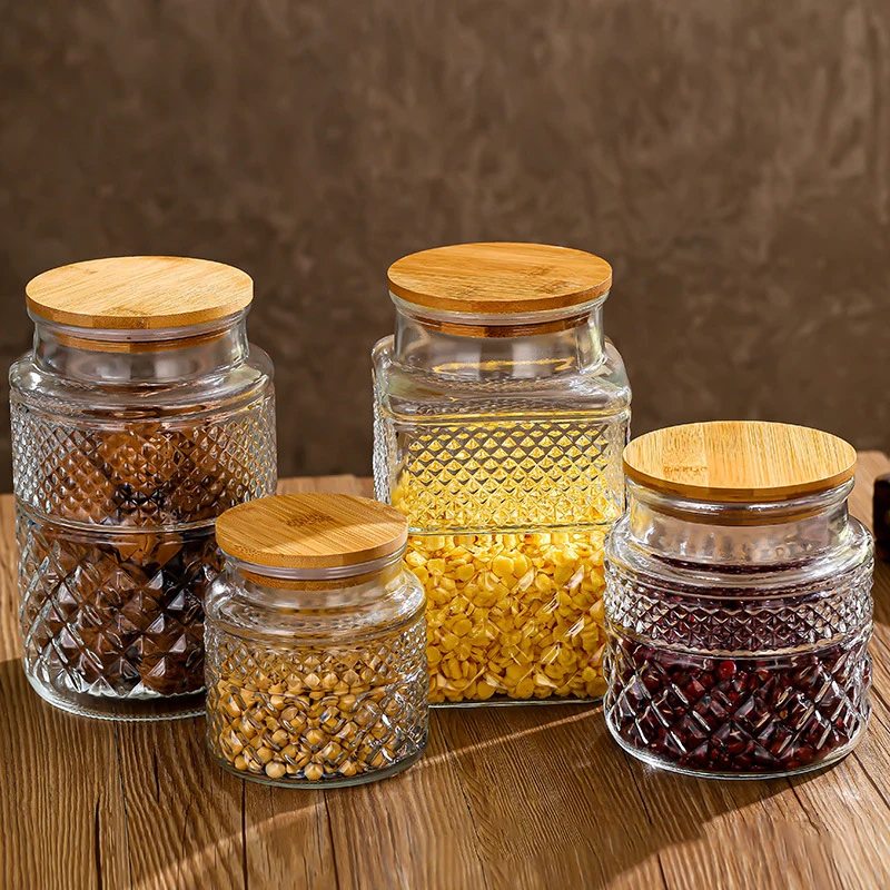 https://ae01.alicdn.com/kf/Se7b55289a67342ed8082f1ba29735261a/Transparent-Glass-Storage-Jar-Wooden-Material-Lid-Carved-Embossed-Sealed-Jar-Food-Container-Home-Decoration-Kitchen.jpg
