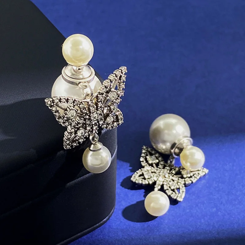 Donia Jewelry Fashion New Butterfly Titanium Steel Micro-Inlaid AAA Zircon Silver Needle Luxury Palace Pearl Earrings.