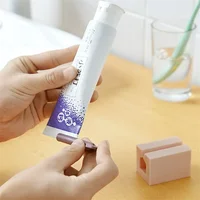 Household Bathroom Accessories - Toothpaste Press, Extruder, Cleanser, Dispenser Device, Lazy Rolling Holder, Clip - on 1