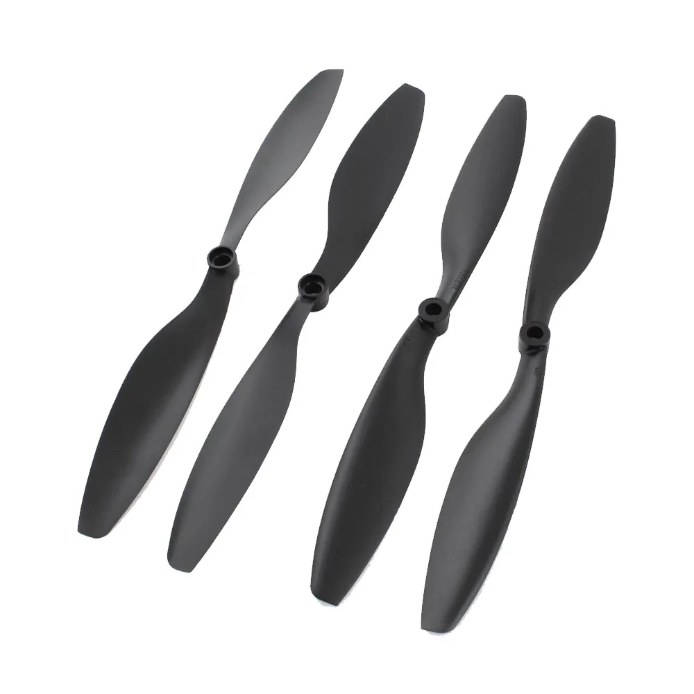 Vue rapprochée d'une hélice RC Multirotor 1045 10 pouces avec bagues adaptatrices, détail des pales et du moyeu.