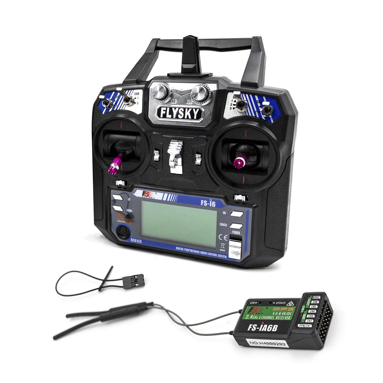Radiocommande 6CH 2.4GHz avec récepteur posée sur fond blanc, idéale pour hélicoptère et planeur RC.