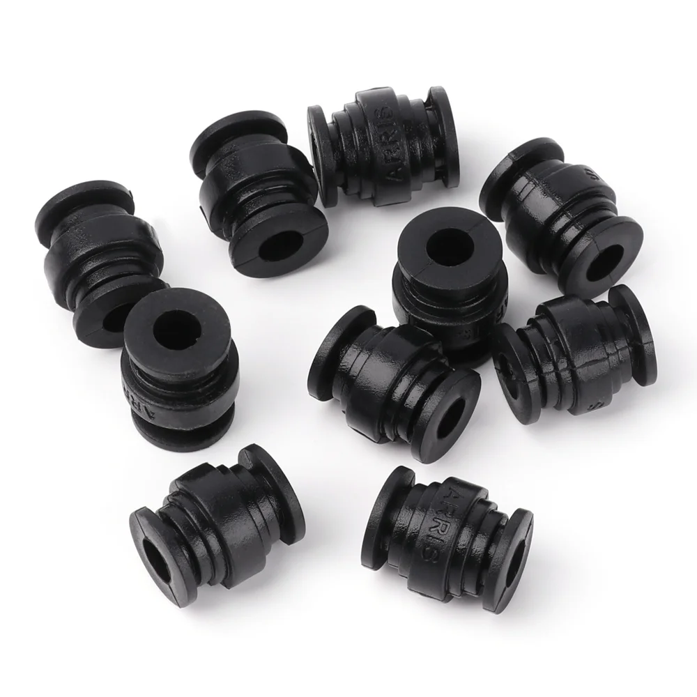 Gros plan sur les amortisseurs silicone 9x3.5x13mm, texture lisse et matériau souple mis en évidence.