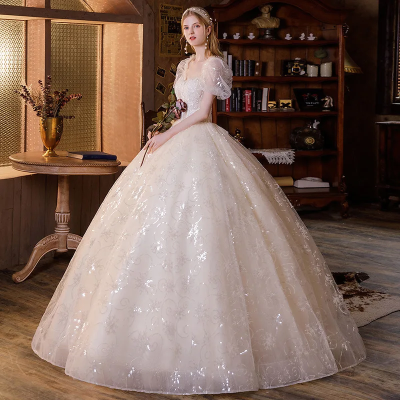 

Luxury Champagne Wedding Dresses 2023 French Style Sweetheart Princess Brides Dress Shiny Sequin A-Line Puff Sleeves Ball Gown