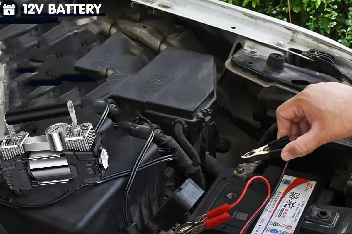 Portabel startkabel med inbyggd däckpump på vit bakgrund