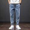 Large size elastic workwear jeans, men's ankle tied Harlan pants, wear-resistant and fat added, plus size trendy and loose 1