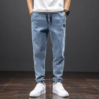 Large size elastic workwear jeans, men's ankle tied Harlan pants, wear-resistant and fat added, plus size trendy and loose 1
