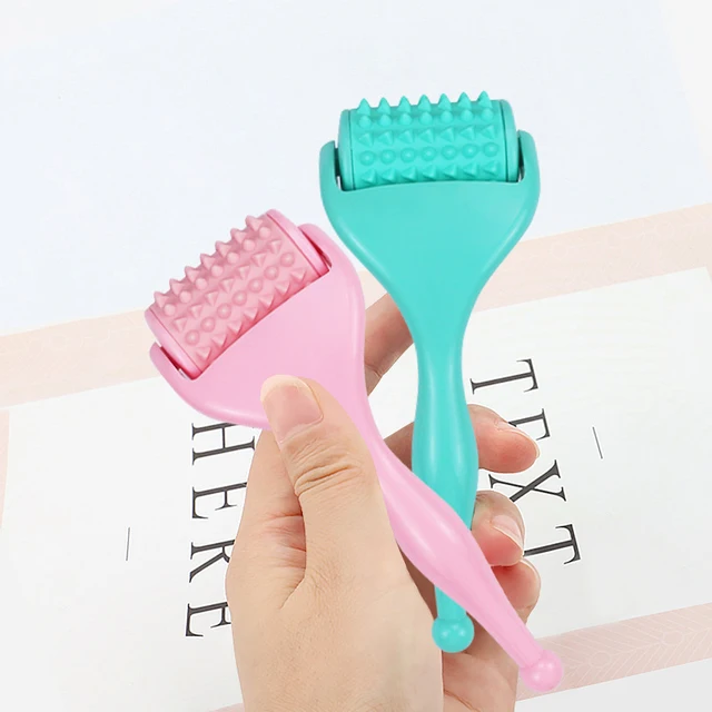 볼링공 모양의 이중 헤드 미용 마사지기: 젊음을 되찾는 피부 관리의 비결