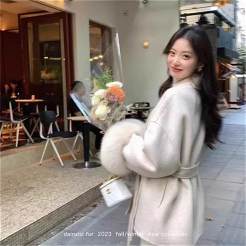 그레이 타이 허리 컬렉션 모직 코트 여성 가을, 겨울 2025 새로운 긴 소매 느슨한 하이 엔드 케이프 코트 중간 길이 탑