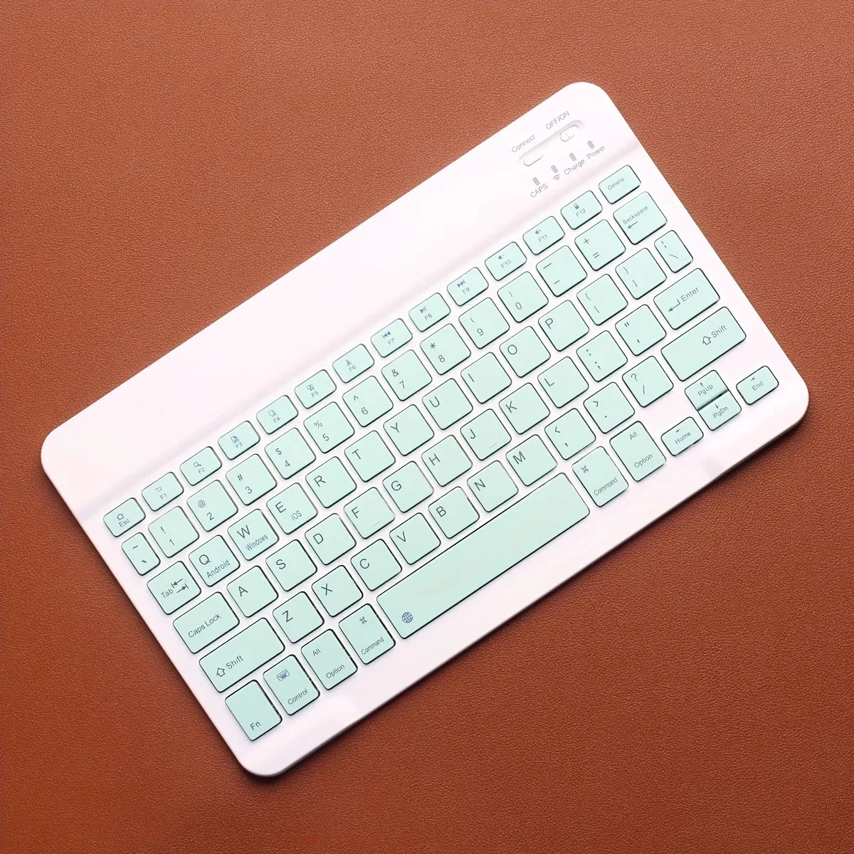 thumbnail image 1 of Teclado compatible con Bluetooth para Android, iOS, Windows, teclado inalámbrico mini delgado para PC, iPad, tableta, teléfono, 1 of 5