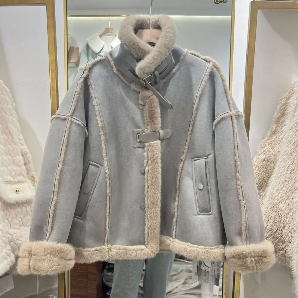 Lamm integrierte Jacke für Frauen mit einem Gefühl von Luxus 2023 Winter neuer Nerzpelz Plüsch Stehkragen Motorradanzug_voghion.com