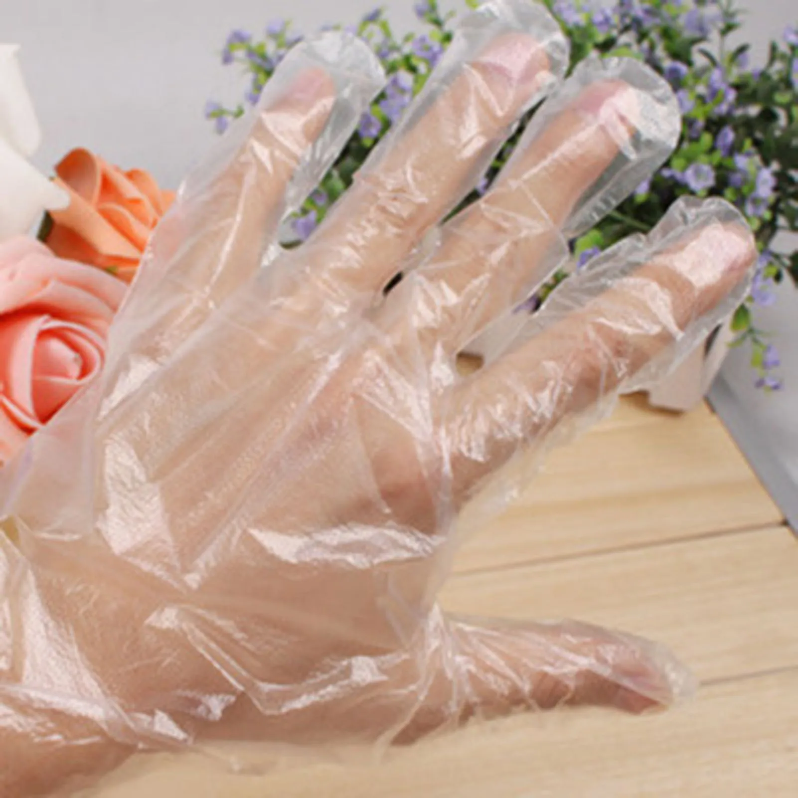 Boîte de gants vinyle jetables transparents, 100 pièces, pour manipulation alimentaire en cuisine.