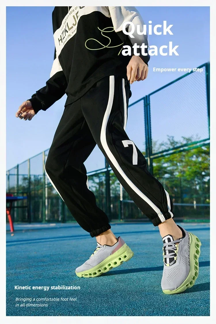 Runner sprinting on lawn in black ultralight running shoes