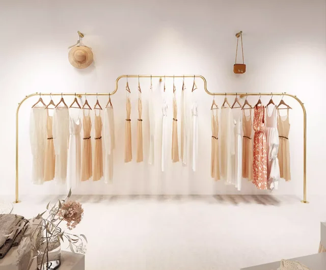 Wall mounted hanging clothes pole on the display rack Wall mounted hanging clothes pole on the display rack