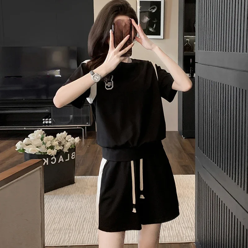 

Летние модные свободные черные шорты с коротким рукавом в Корейском стиле y2k комплект из двух предметов для бега в академическом стиле Повседневный Спортивный костюм для женщин