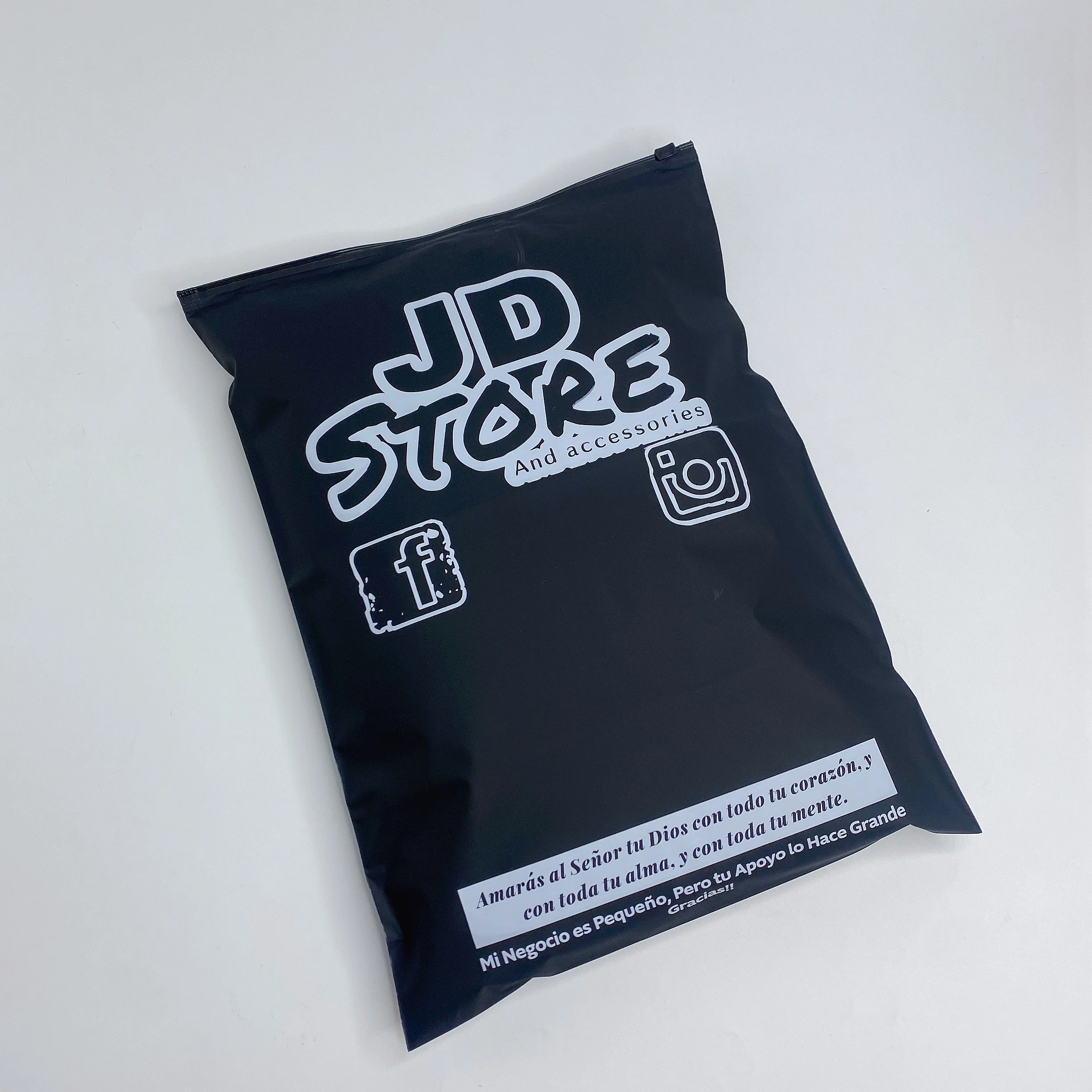 

eco frienldlywholesale luxury 50pcs black poly plastic frosted zip lock clothing packaging bags with own logo