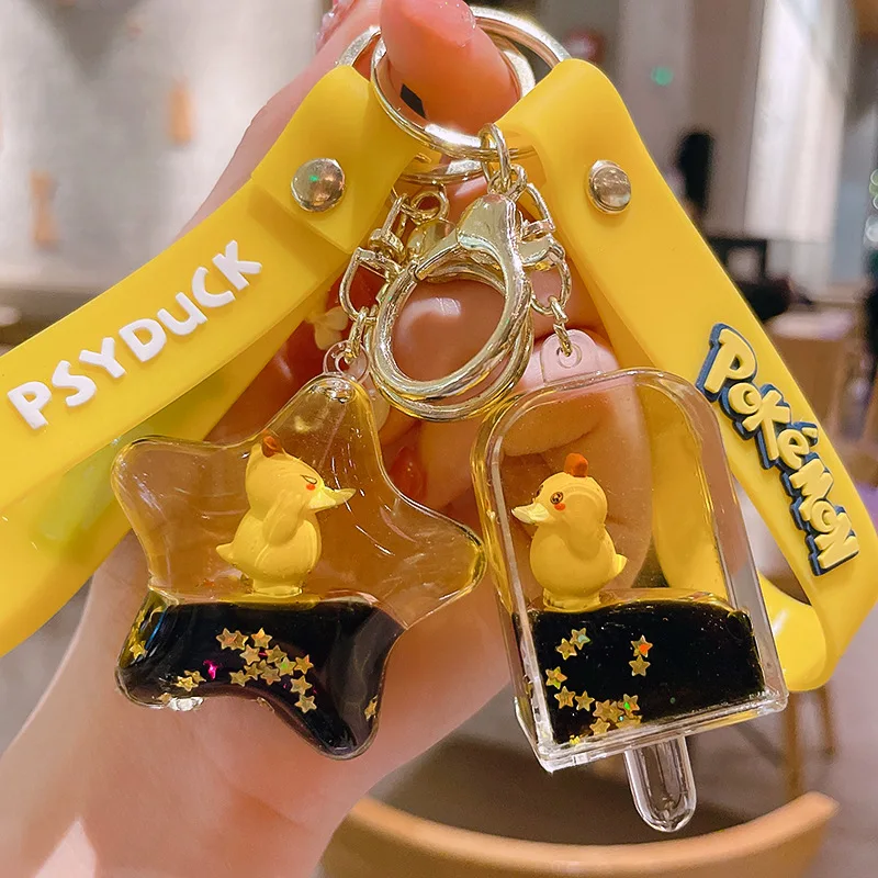 Netizens can reach duck keychains with oil floating cartoon figurine keychains, quicksand bottle pendants 3