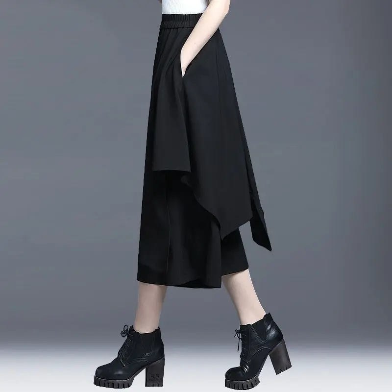 Fashion Spliced Folds Asymmetrical Casual Wide Leg Pants Women Clothing 2024 Summer New Loose Elastic High Waist Irregular Pants