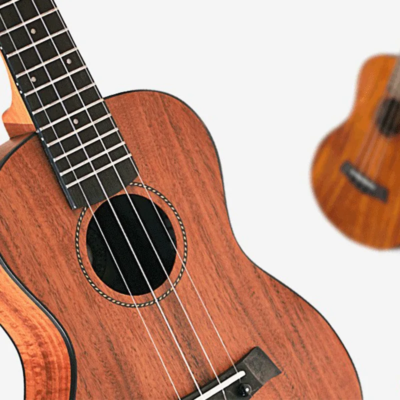Small four stringed guitar best sale