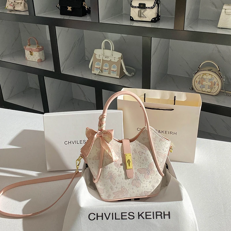 حقيبة حمل جلدية محمولة للنساء، تتميز بطباعة زهور ر...