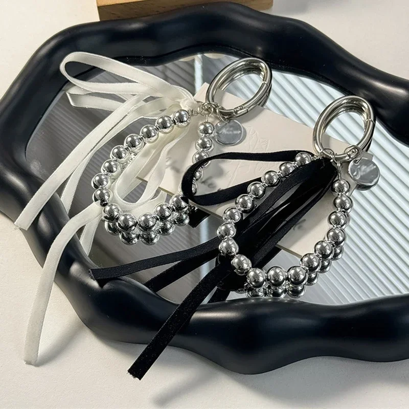 SMUOBT 2 Portachiavi Con Fiocco E Perle Per Donna - Portachiavi Da Polso Per Auto, Accessorio Alla Moda (Bianco)