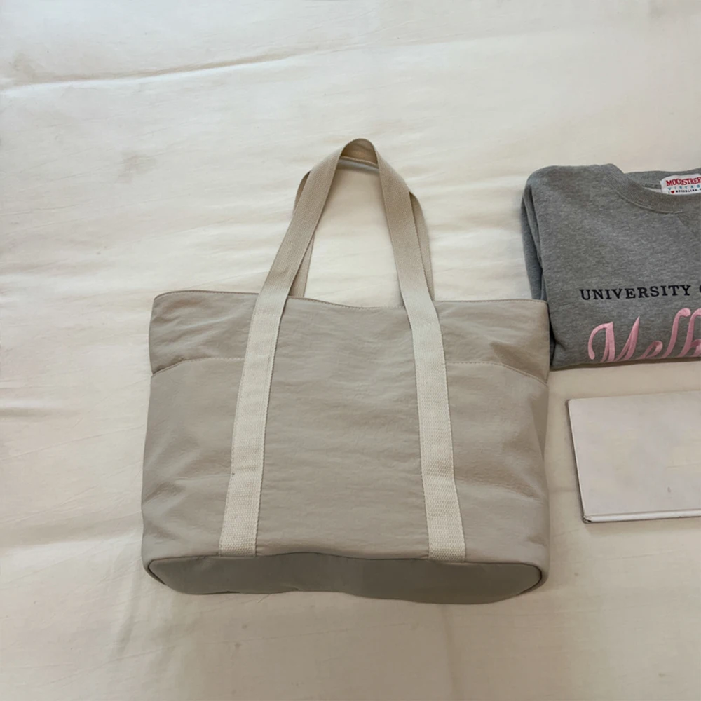 Borsa tote in tela casual, alla moda e di tendenza, con grande capacità, leggera, ideale per il pendolarismo, dal design semplice. - immagine 2