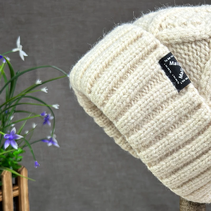 2024 New Women's hats High quality Fur pompom hat Beanies Winter Hats for women Fashion Hat bonnet Female Twist pattern caps 3