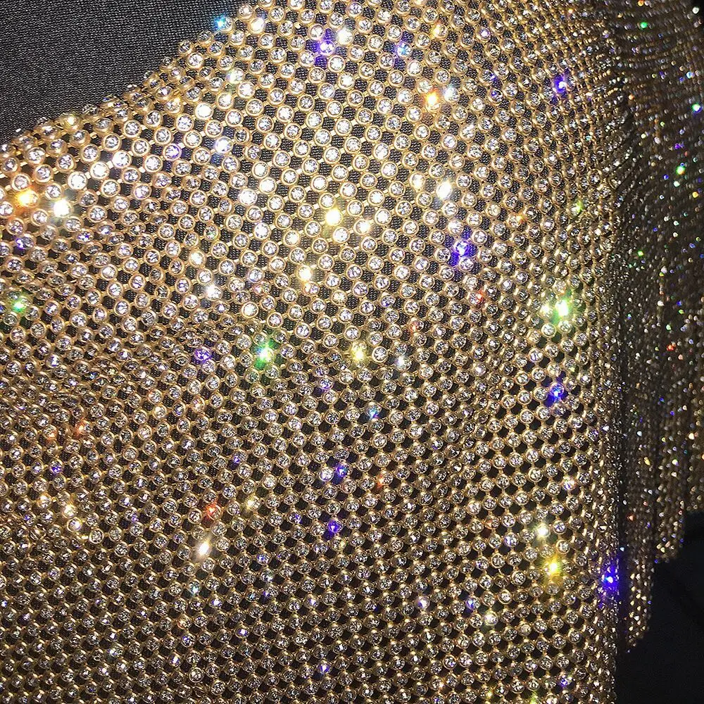 Camiseta sin mangas de malla metálica con diamantes de imitación para mujer, top corto con cadena hueca en la espalda, chaleco sexy para fiesta en la playa