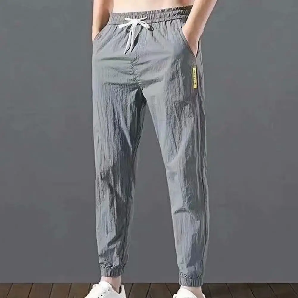 

Summer Pants Sporty Loose Trousers Loose Mid Rise Drawstring Pants Casual Solid color Pockets Trousers for Sports