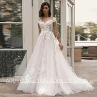 Woman Wedding Dress Customized Cap Sleeve Scoop Neck Lace Applique Sweep Train Illusion Back Buttons Princess Bridal Gown 1