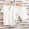 1 Set Men's Short Sleeve Shorts Set Summer Cotton and Linen Two Button Large Size Solid Color Men's T-shirt Two-piece Set 2