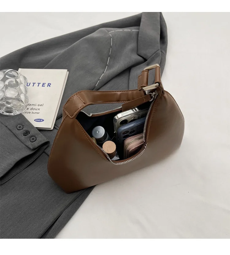 Sotto le ascelle da donna 2024 nuovo modello minimalista a mezzaluna con temperamento versatile, viaggio casual, consistenza portatile,_voghion.com
