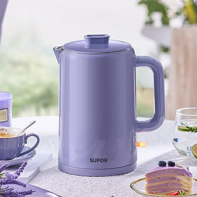 Purple electric kettle stock photo. Image of handle - 131338990